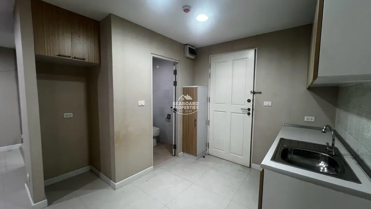 Unicca Condominium Room Entrance and Built-in Cabinetry